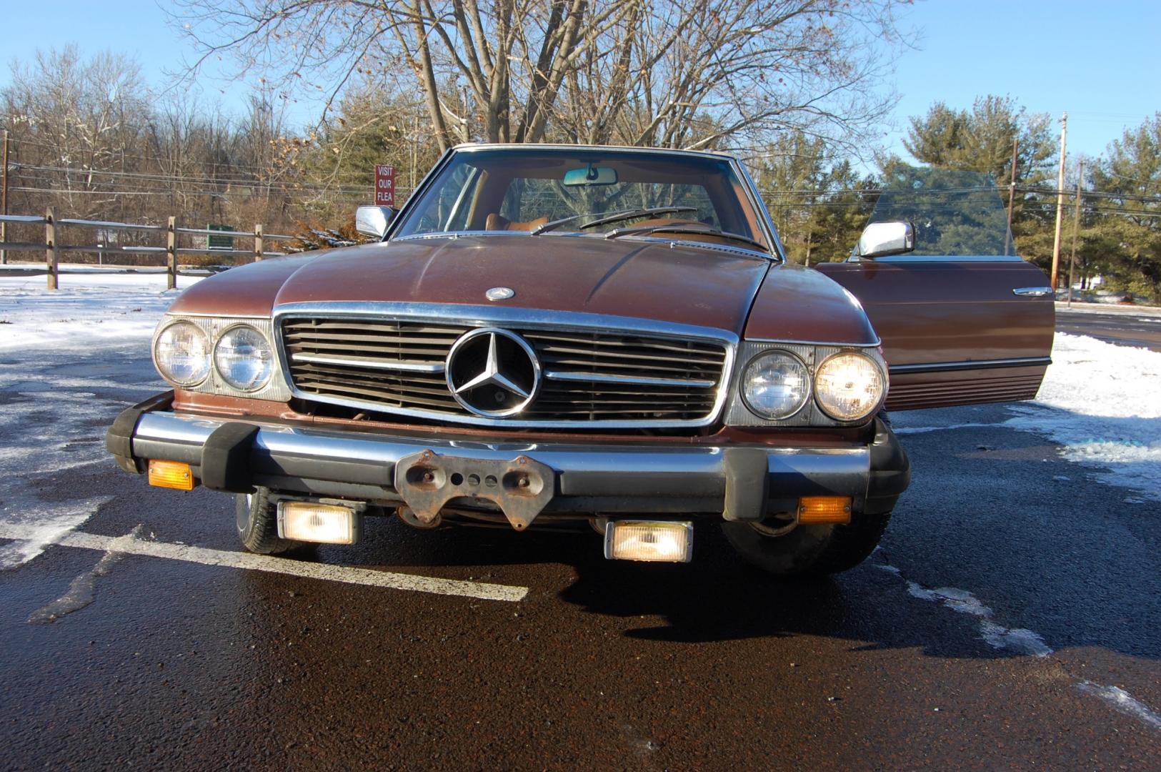 1976 Brown /Brown Leather Mercedes-Benz 450SL (10704412030) with an 4.5L V8 engine, Automatic transmission, located at 6528 Lower York Road, New Hope, PA, 18938, (215) 862-9555, 40.358707, -74.977882 - Here we have a nice 1976 Mercedes 450SL convertible with a 4.5L V8 engine putting power to the rear wheels via an automatic transmission. Some options on this vehicle include brown leather, wood trim, power windows, removable hard top, heat, A/C, AM/FM radio, cruise control, wood steering wheel, 14 - Photo#23